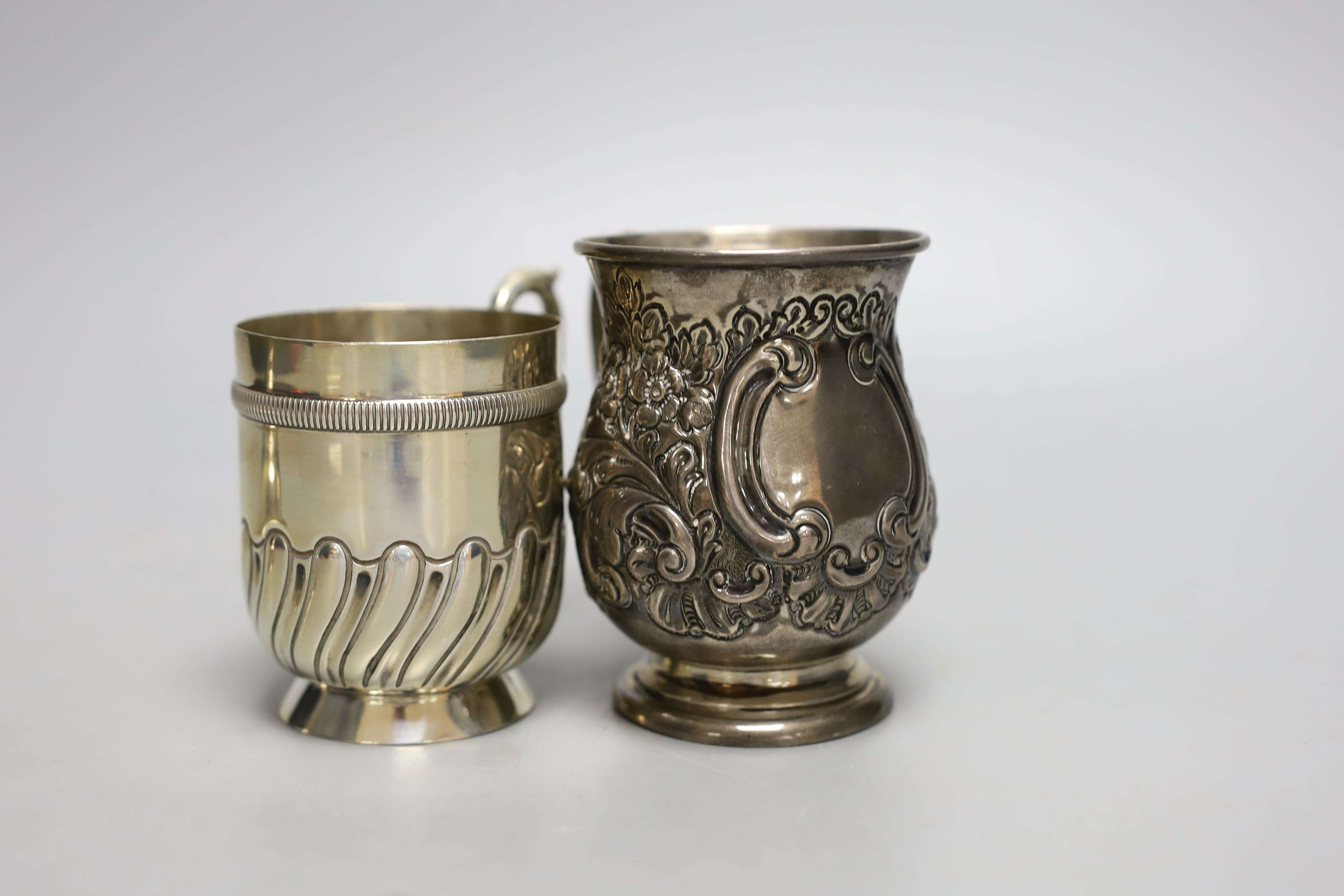Two late 19th/early 20th century silver christening mugs and a modern silver wine funnel, 9.5oz.